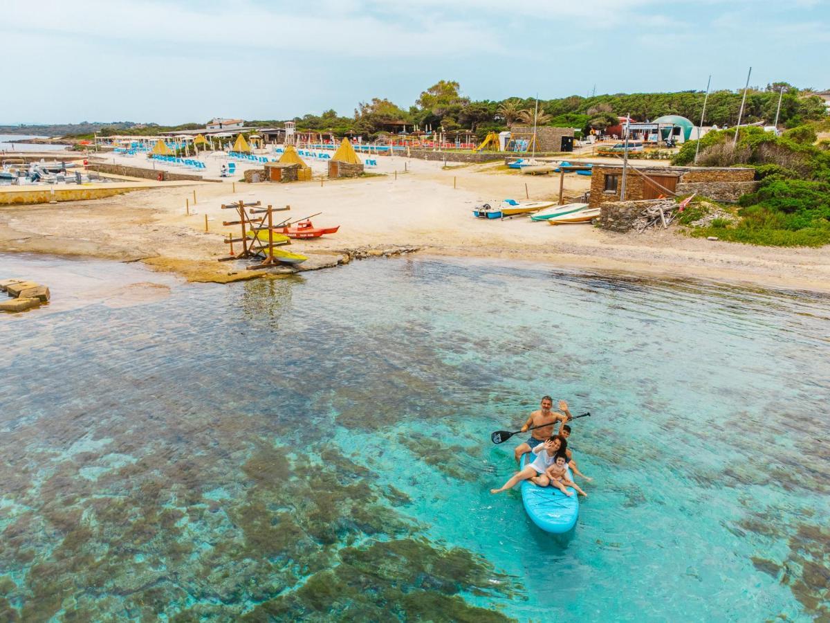 Unahotels Club Hotel Ancora Stintino Bagian luar foto