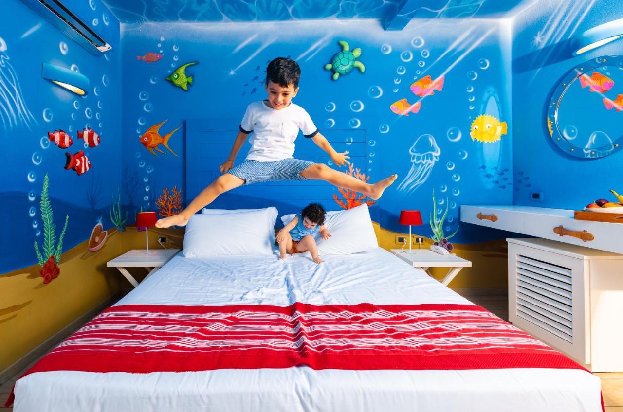 Unahotels Club Hotel Ancora Stintino Bagian luar foto