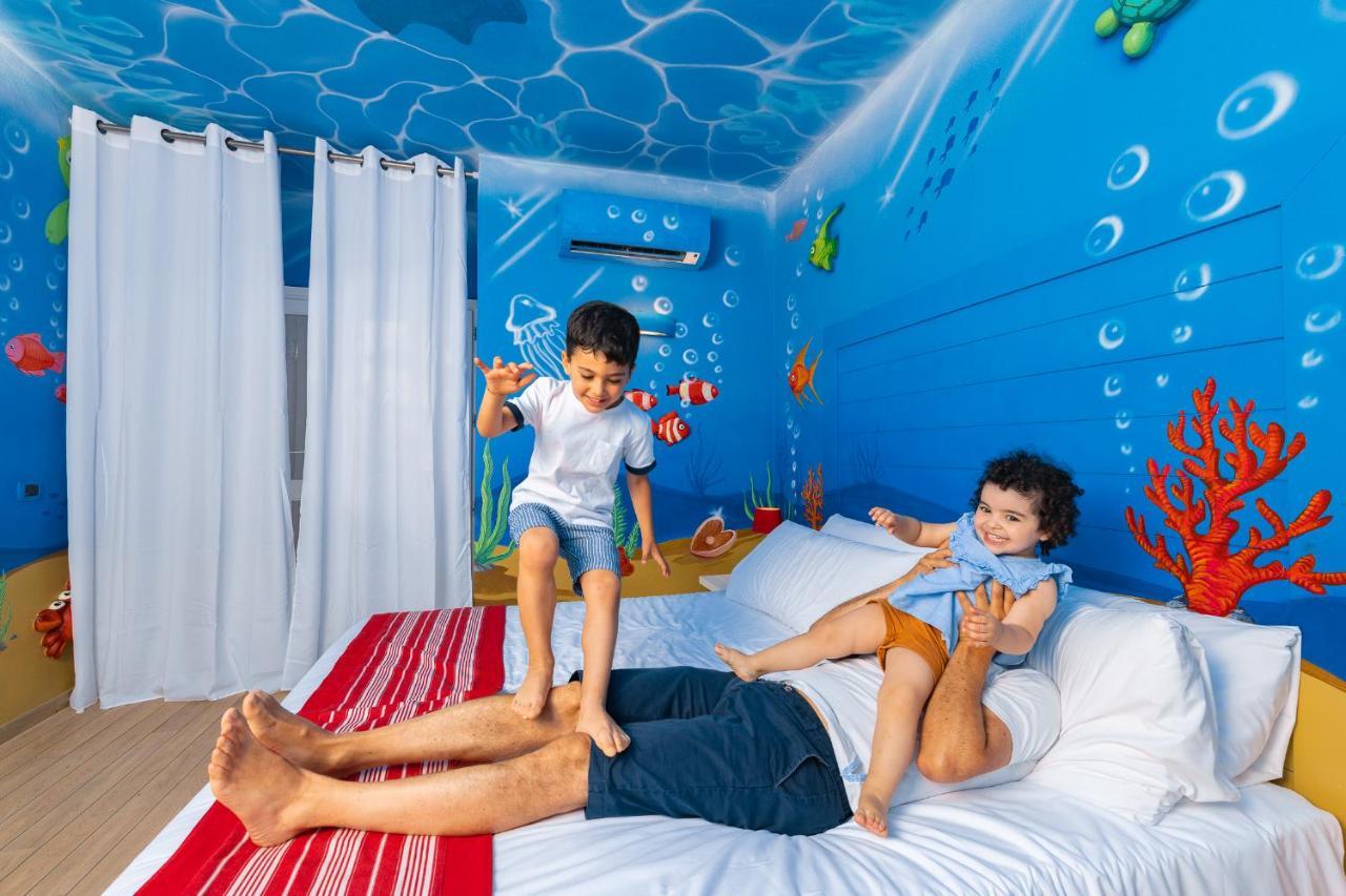 Unahotels Club Hotel Ancora Stintino Bagian luar foto